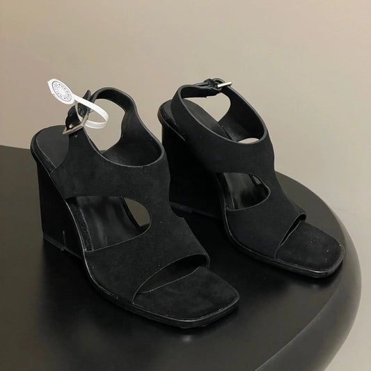 HM 25S KALYA WEDGE SANDAL 100 MM IN BLACK SUEDE